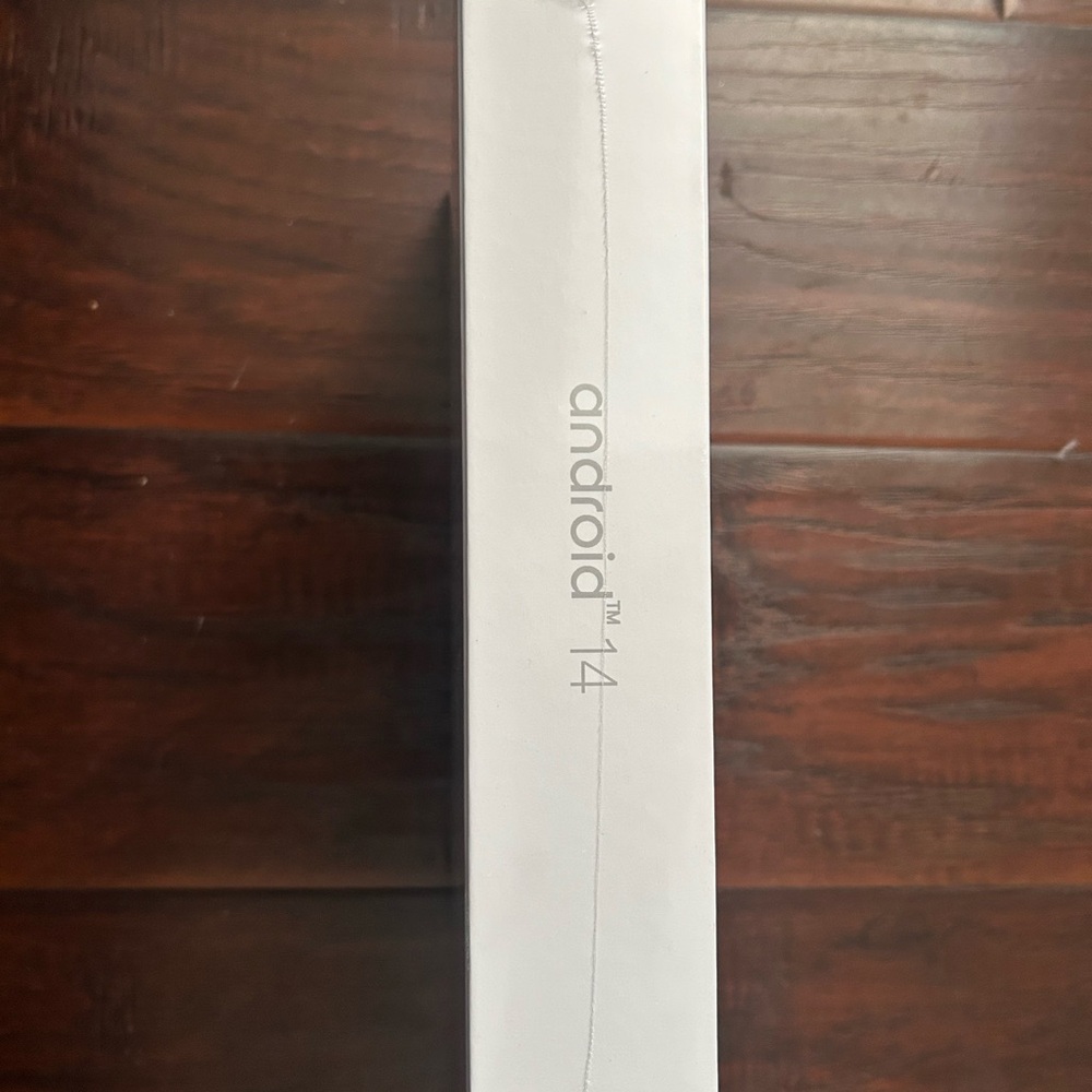 White Tablet with Rounded Corners and Colorful Display - Picture 2 of 2